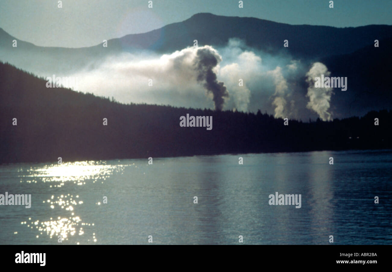 Smoke Rising from Oil Refinery in Southeast Alaska Stock Photo