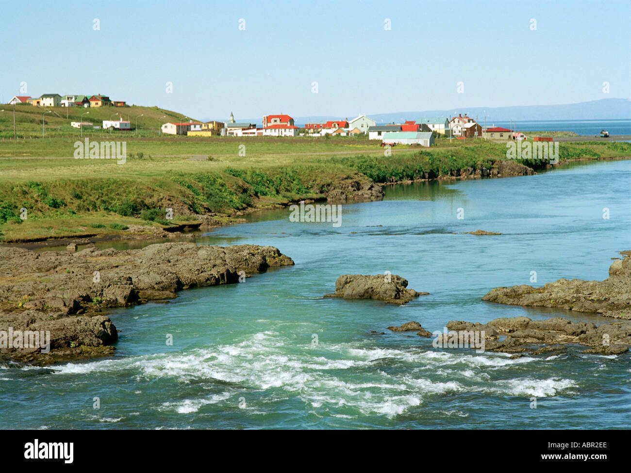 Tiny Fishing Community and Stream in the Fjords of Iceland Stock Photo
