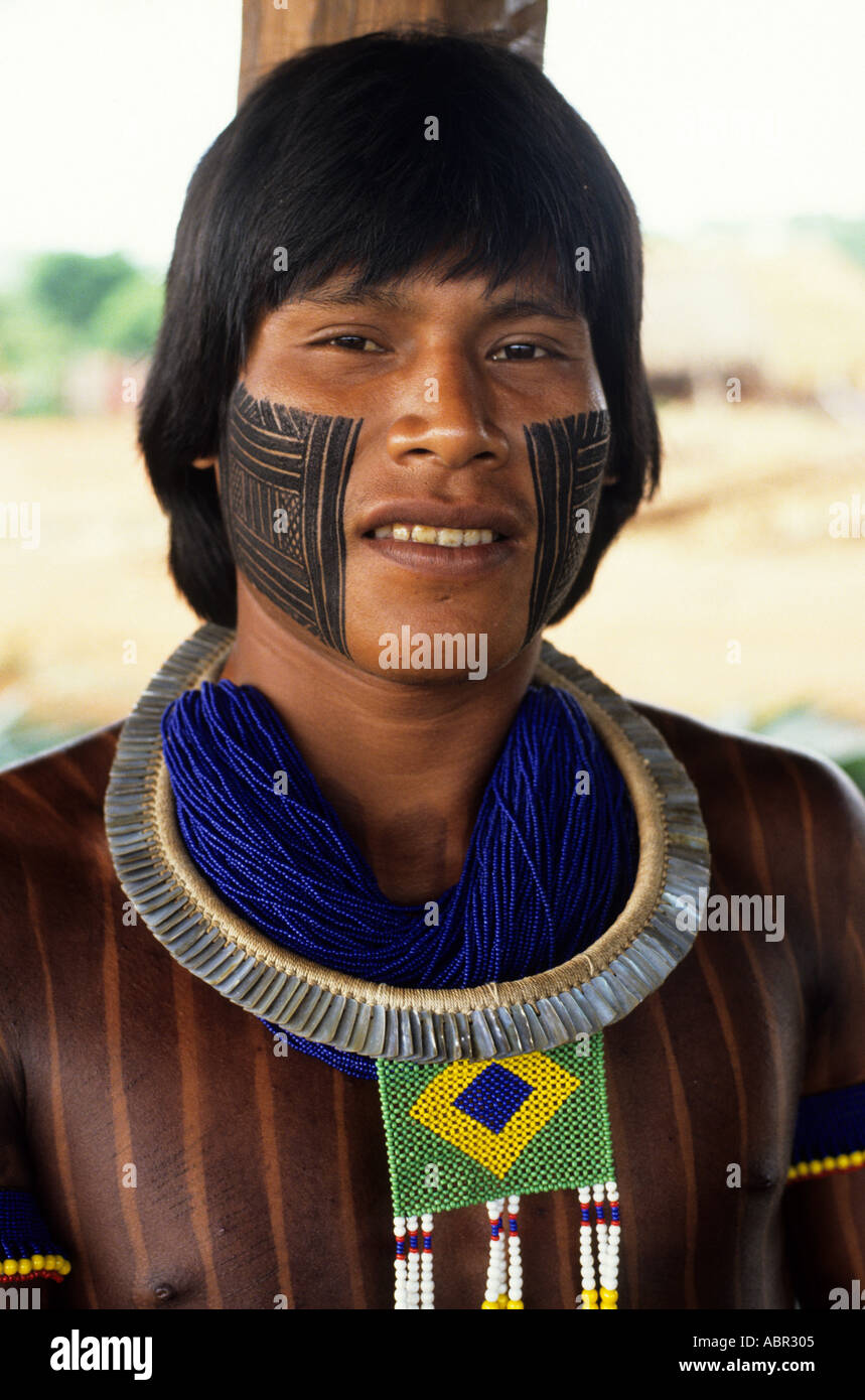 A-Ukre village, Brazil. Bengoti, Megranoti- Kayapo warrior wearing the Brazilian flag in bead work; Xingu Indigenous Area, Para state. Stock Photo