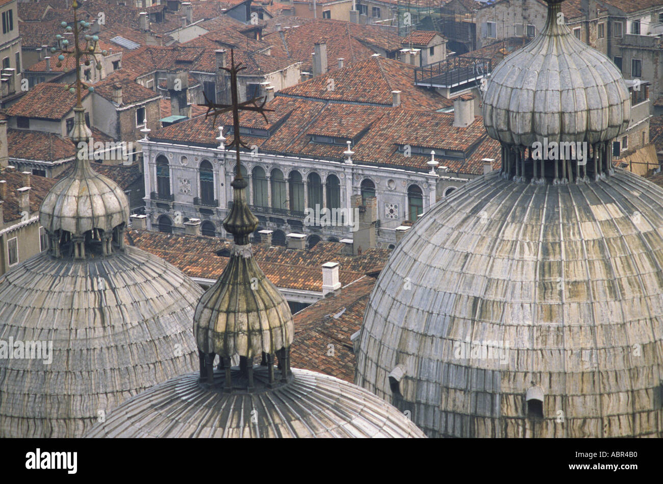 Cupola dome roofs of St Mark's Basilica Venice with rooftops beyond view from the campanile