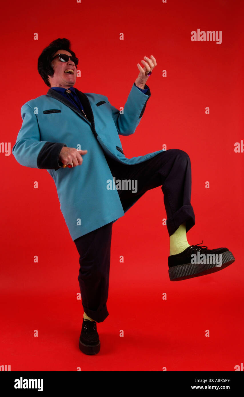 Old Rocker playing a air guitar Stock Photo - Alamy