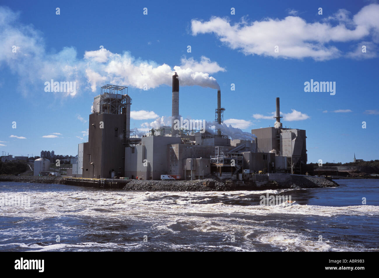 Irving Pulp and Paper Mill and the Reversing Falls in Saint John New  Brunswick Canada with Jet Boat Stock Photo - Alamy