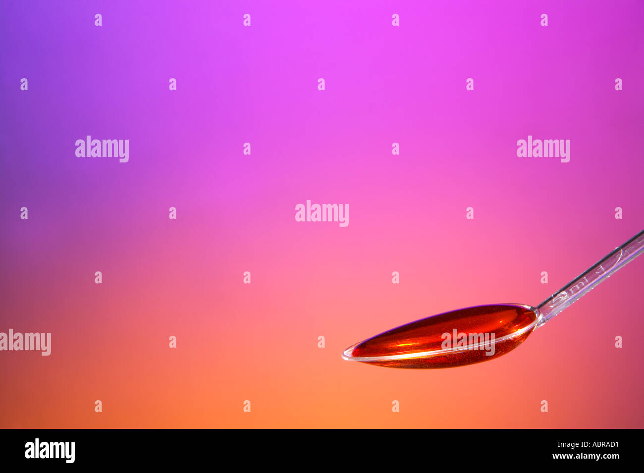 PLASTIC SPOON CONTAINING MEASURED DOSE OF MEDICINE Stock Photo Alamy