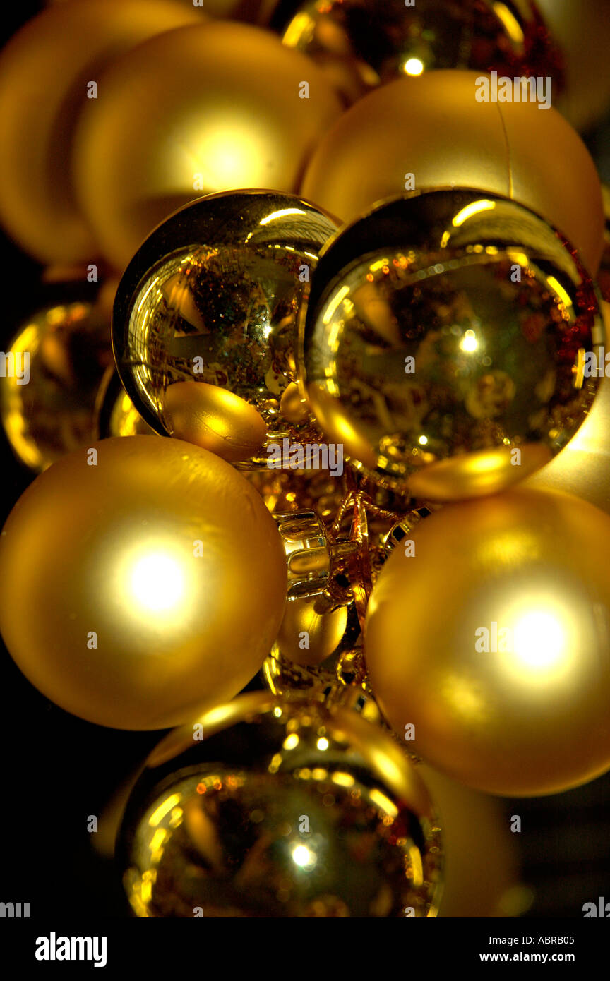 Gold Baubles Christmas Decorations Hanging From Ceiling