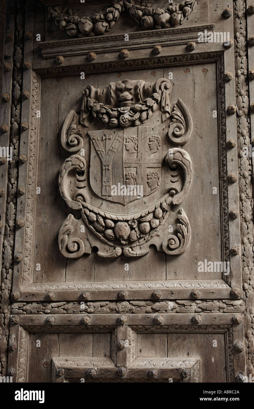 Carved wooden door on Christchurch gate Canterbury Cathedral Canterbury Kent England Stock Photo
