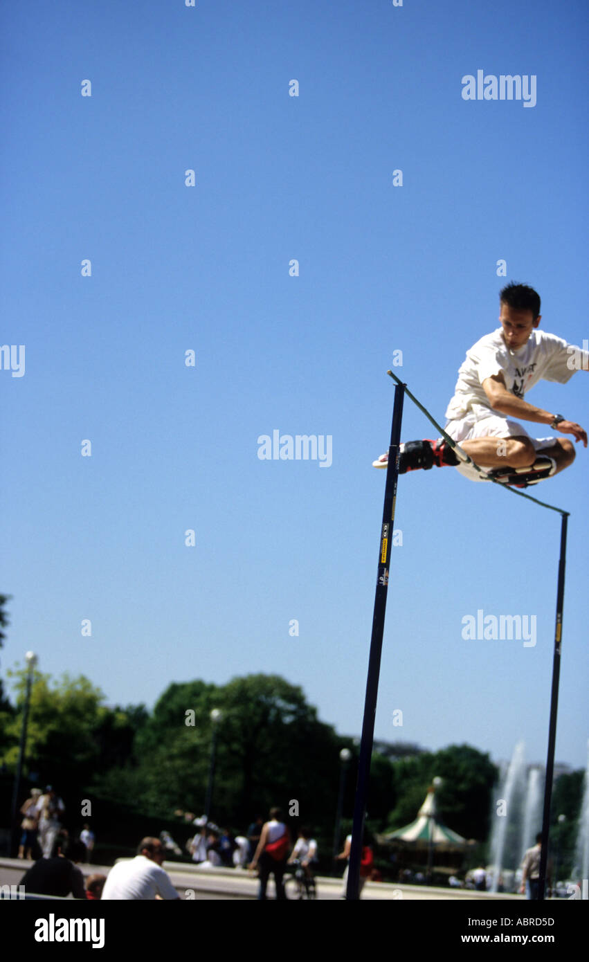 Roller skater jumping high bar in Trocadero plaza Paris France Stock Photo Alamy