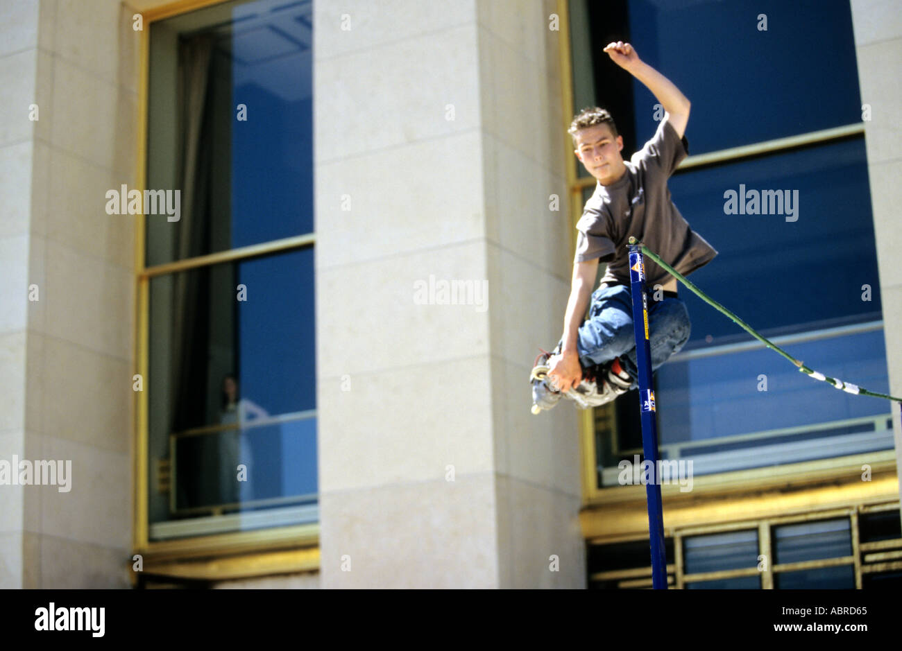 Roller skater jumping high bar in Trocadero plaza Paris France Stock Photo Alamy