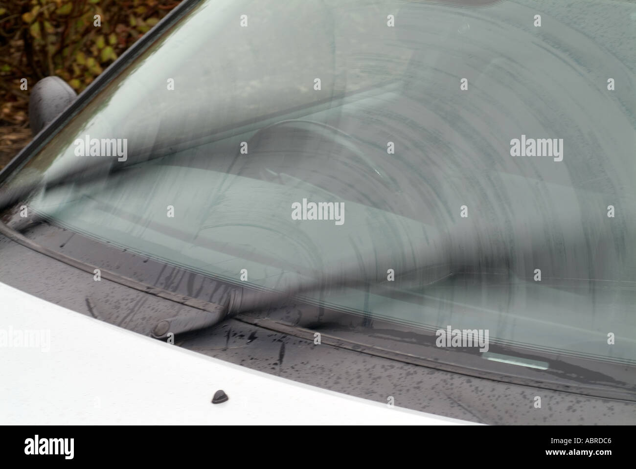car windscreen wipers blade rubber visability view see weather condition spray rain water wet driving drive Stock Photo