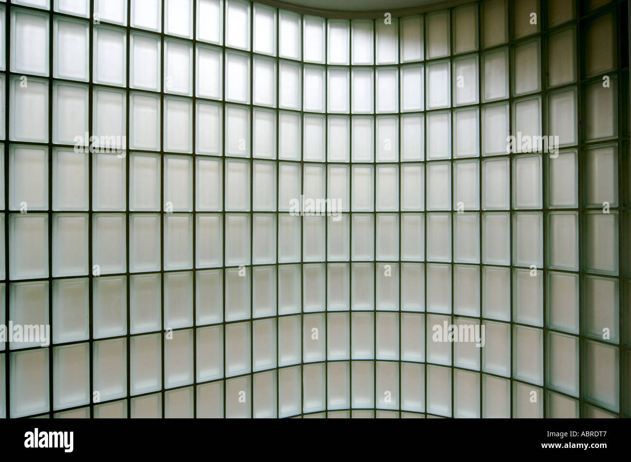 small square glass bricks in wall abstract design pattern repeating