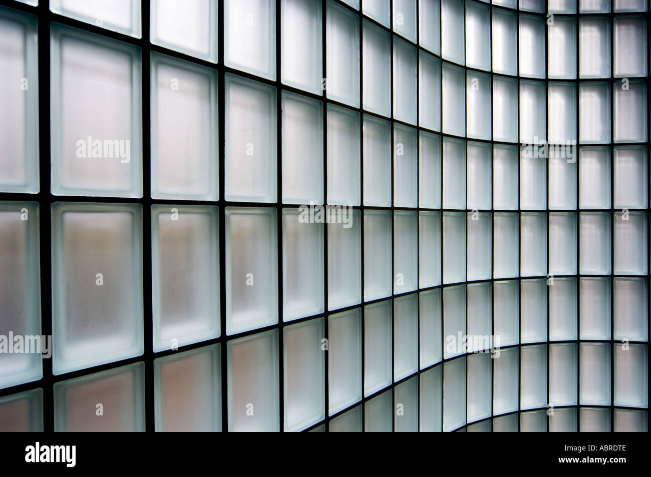 small square glass bricks in wall abstract design pattern repeating