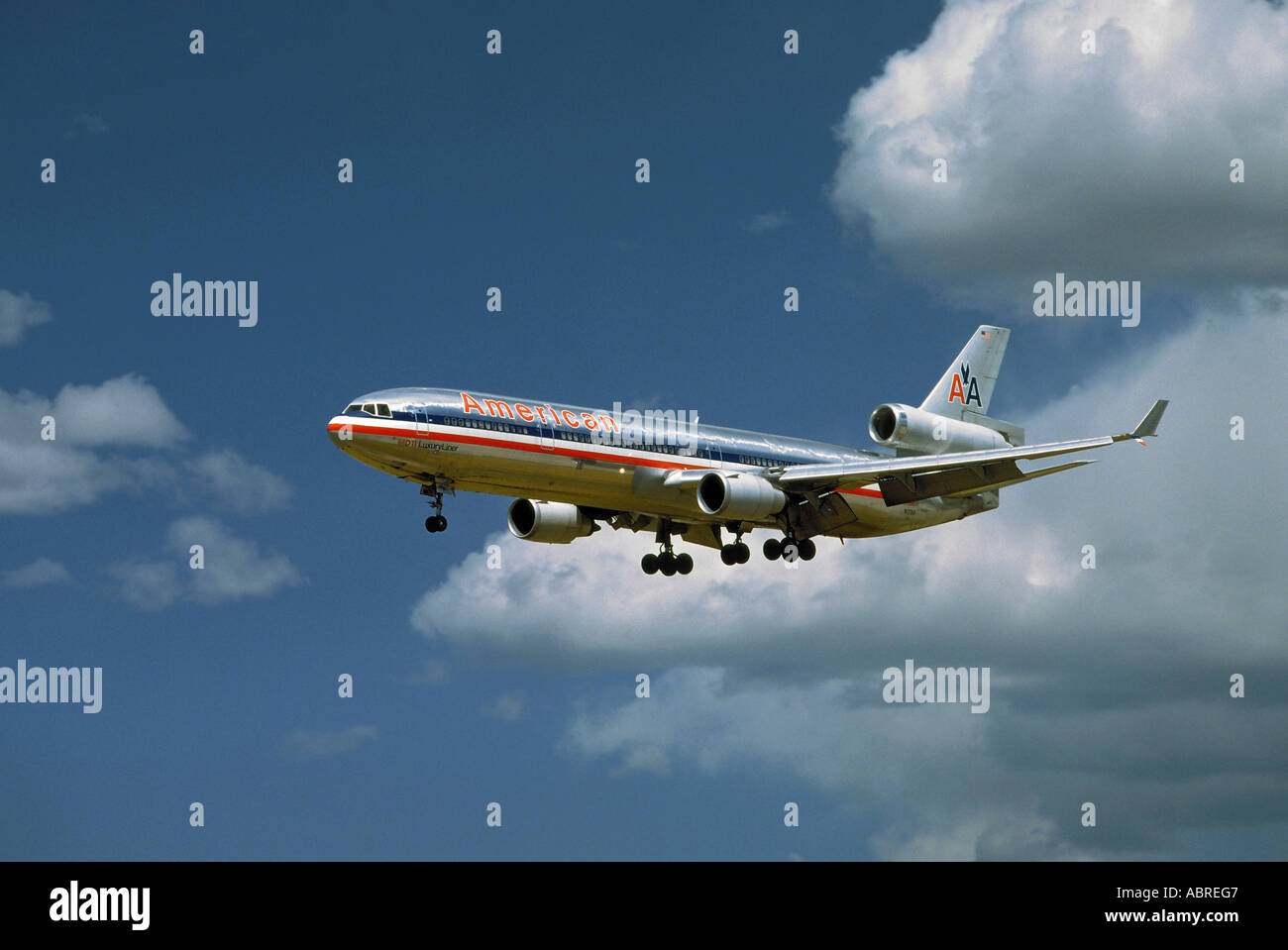 An American Airlines MD-11 or Douglas DC-10 as this plane was originally called comes in for landing at LAX, Los Angeles, Califo Stock Photo