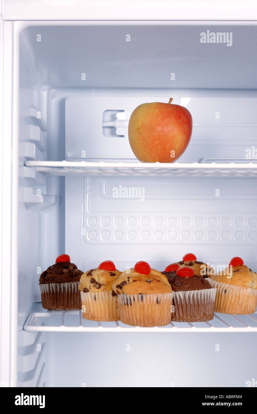 In Fridge Choice, The Apple or The Muffin Stock Photo Alamy