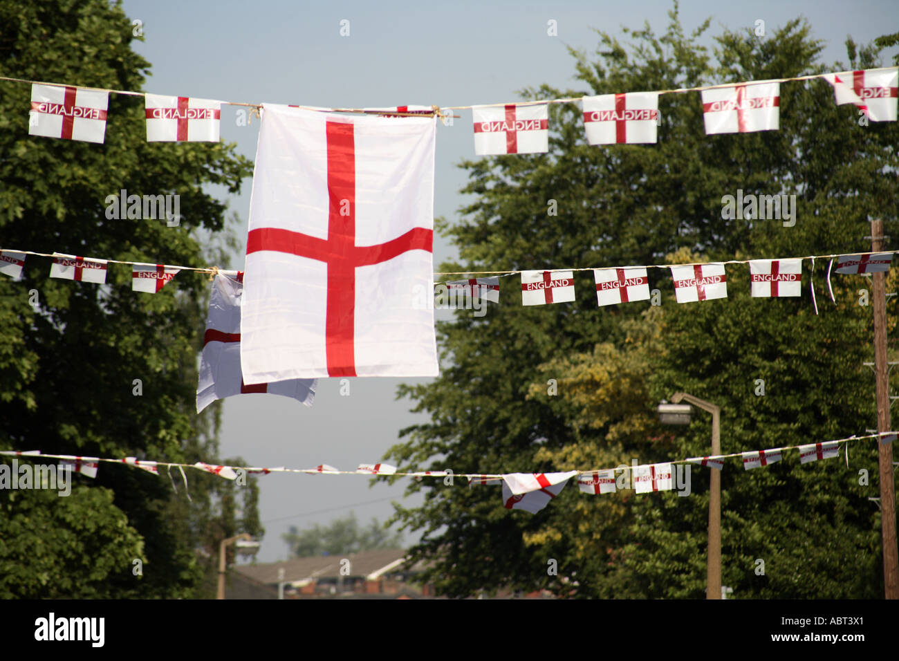 Patriotic scene of England flags and buntings on a street in the North West of England during World Cup 2006 Stock Photo