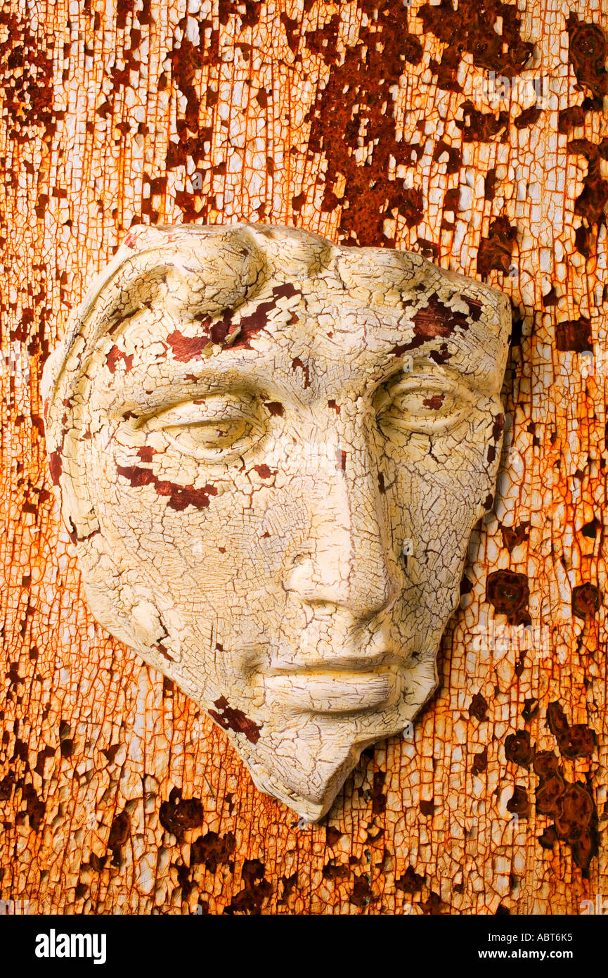 Cracked face on cracked background Stock Photo