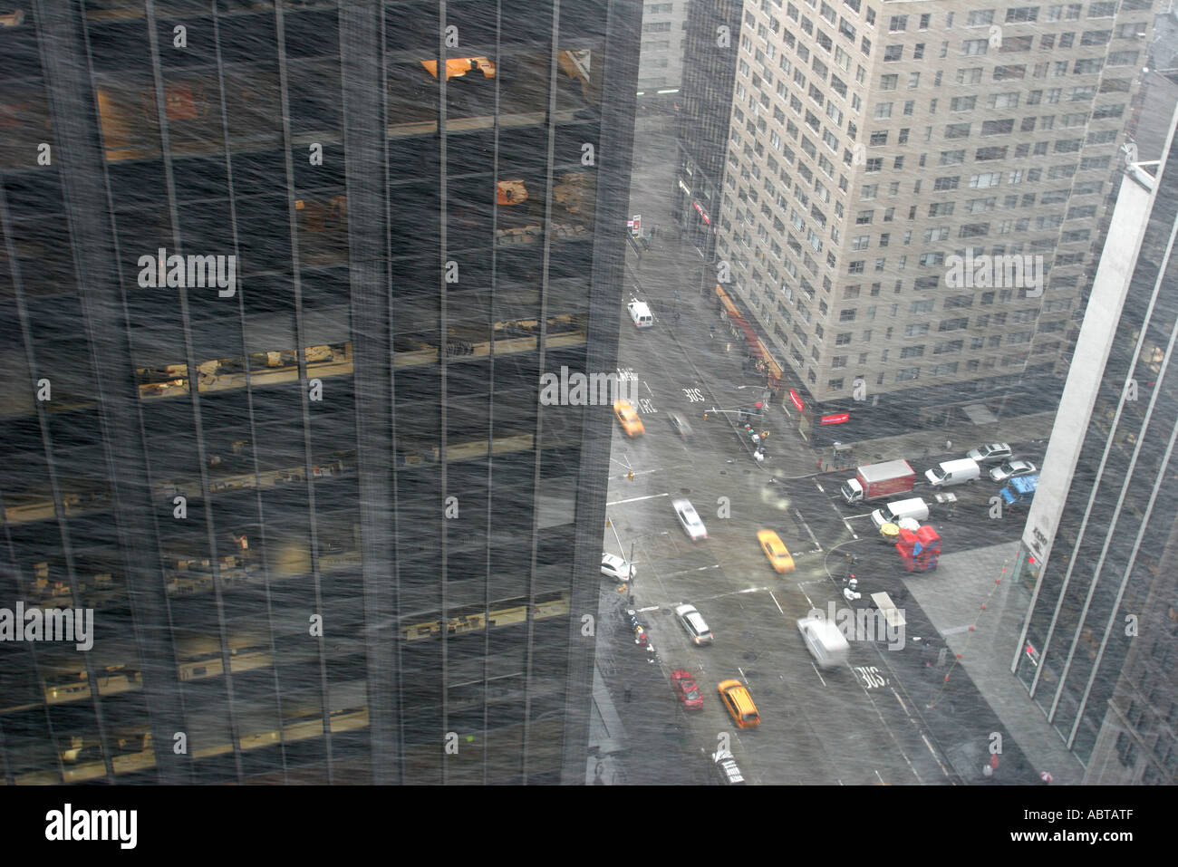 New York City,NY NYC Manhattan,Avenue of the Americas,55th Street,Hilton Hotel view,snow,blizzard,storm,buildings,city skyline,downtown,city center ce Stock Photo