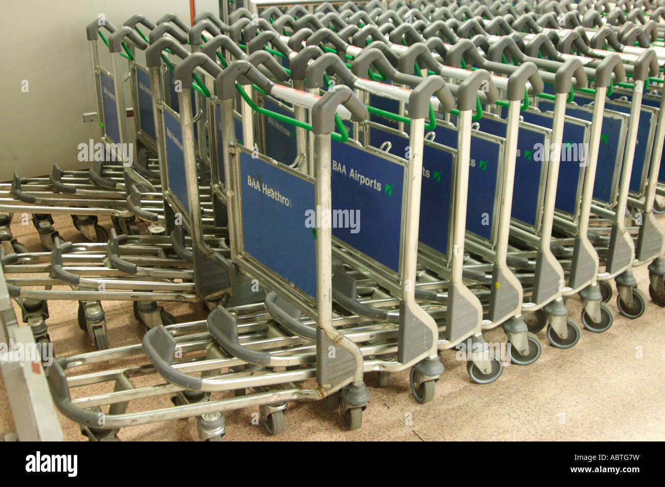 baggage trolley heathrow airport Stock Photo - Alamy