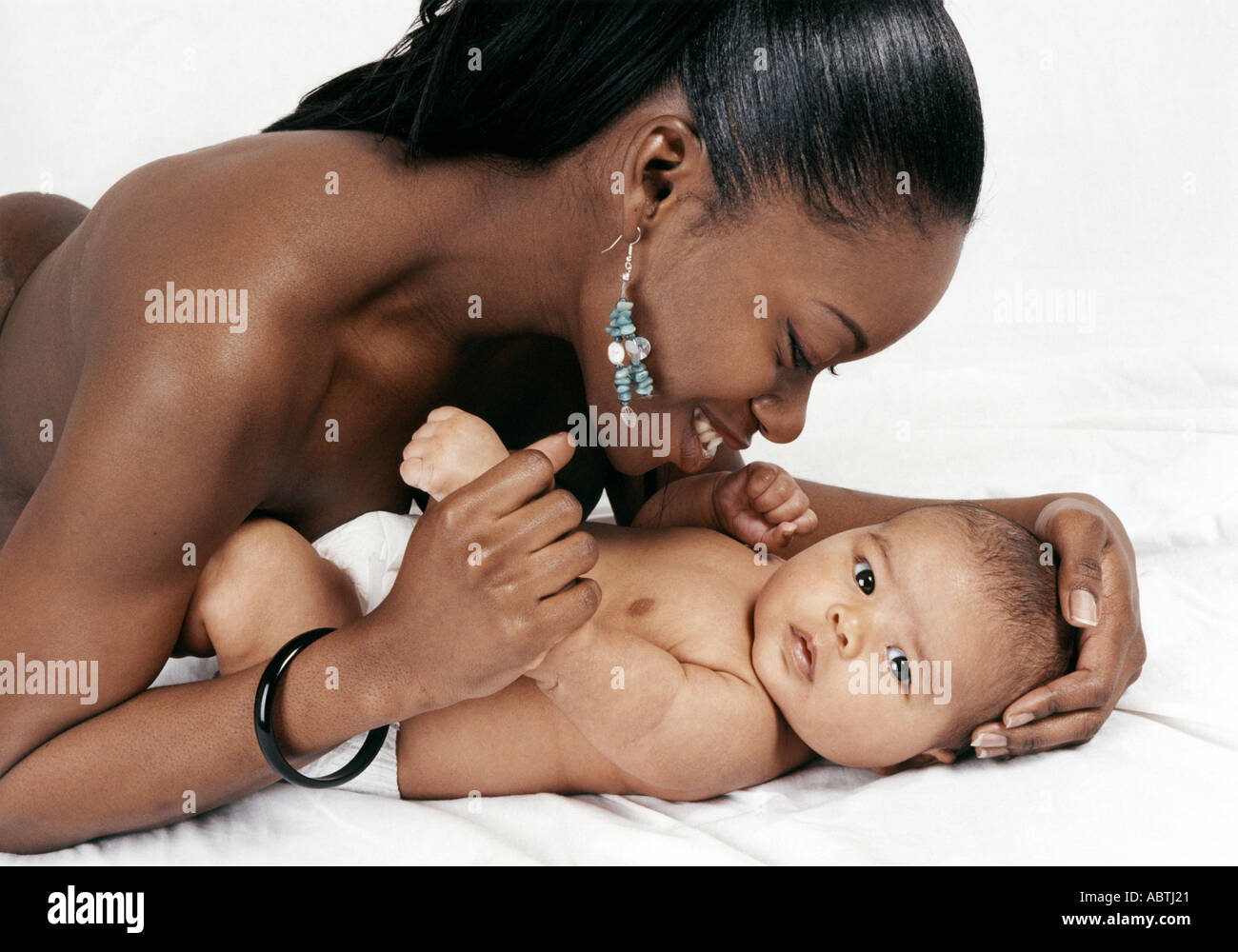 Coloured Mother and Baby Stock Photo