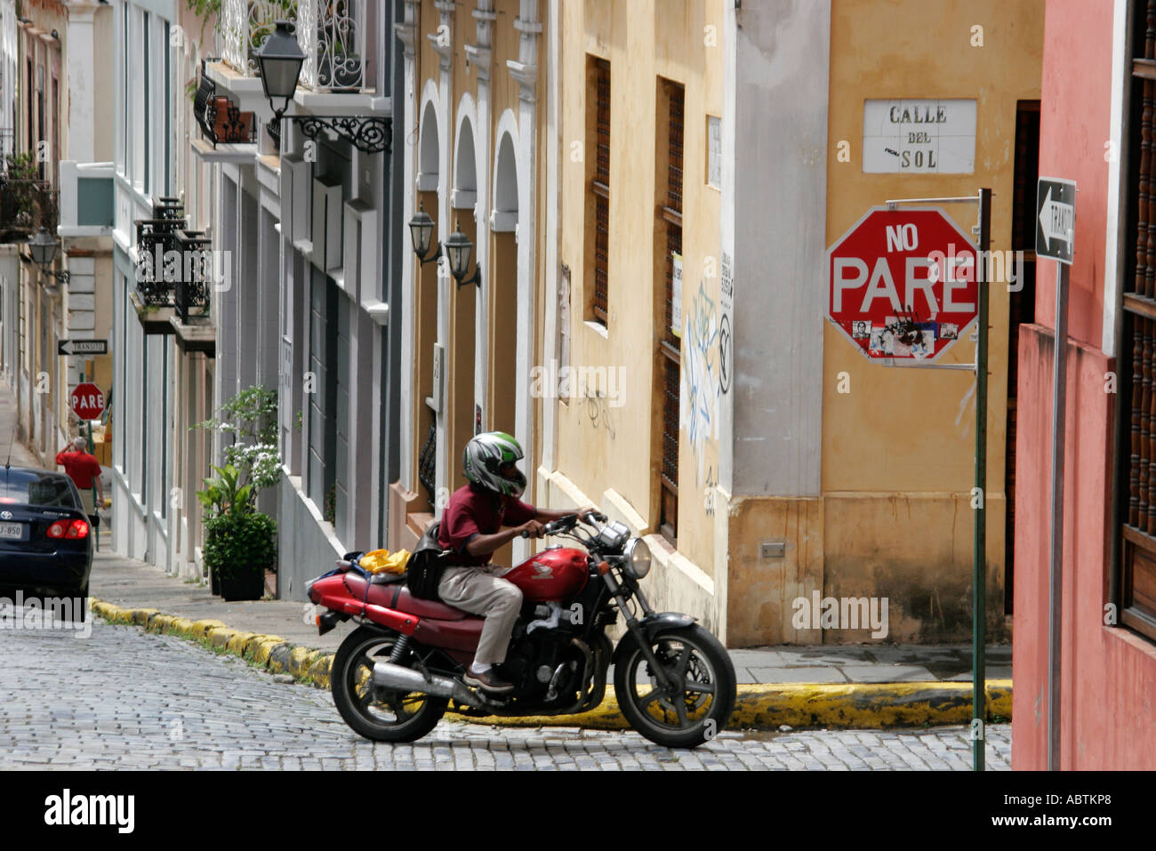 Puerto Rico,Rican,Caribbean Island,Greater Antilles Old San Juan,capital city,Calle del Sol,architecture,architectural,steep hill,motorcycle motorcycl Stock Photo