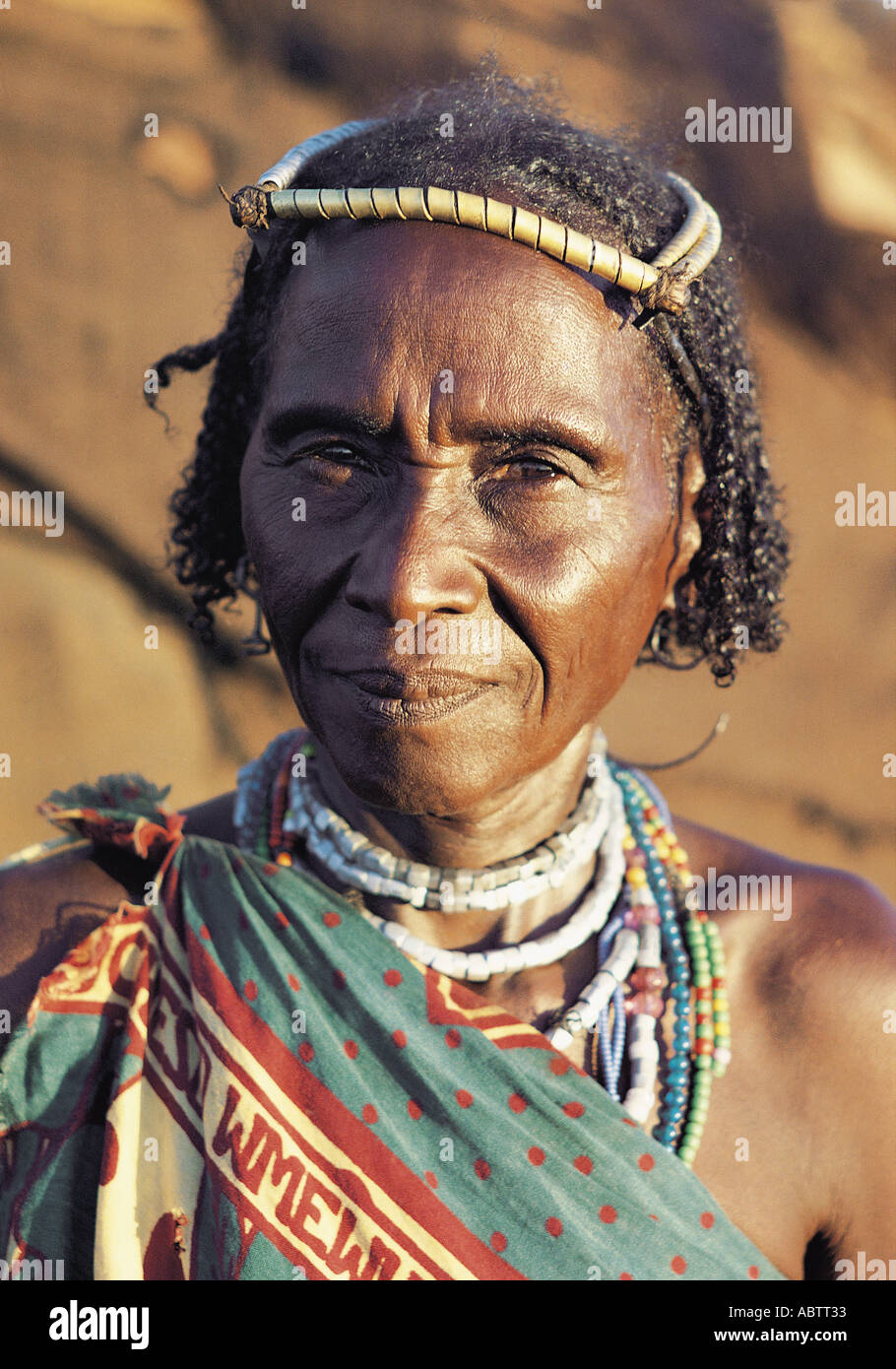 Mature Gabbra woman with typical headband made of aluminium Near Maikona northern Kenya East Africa Stock Photo