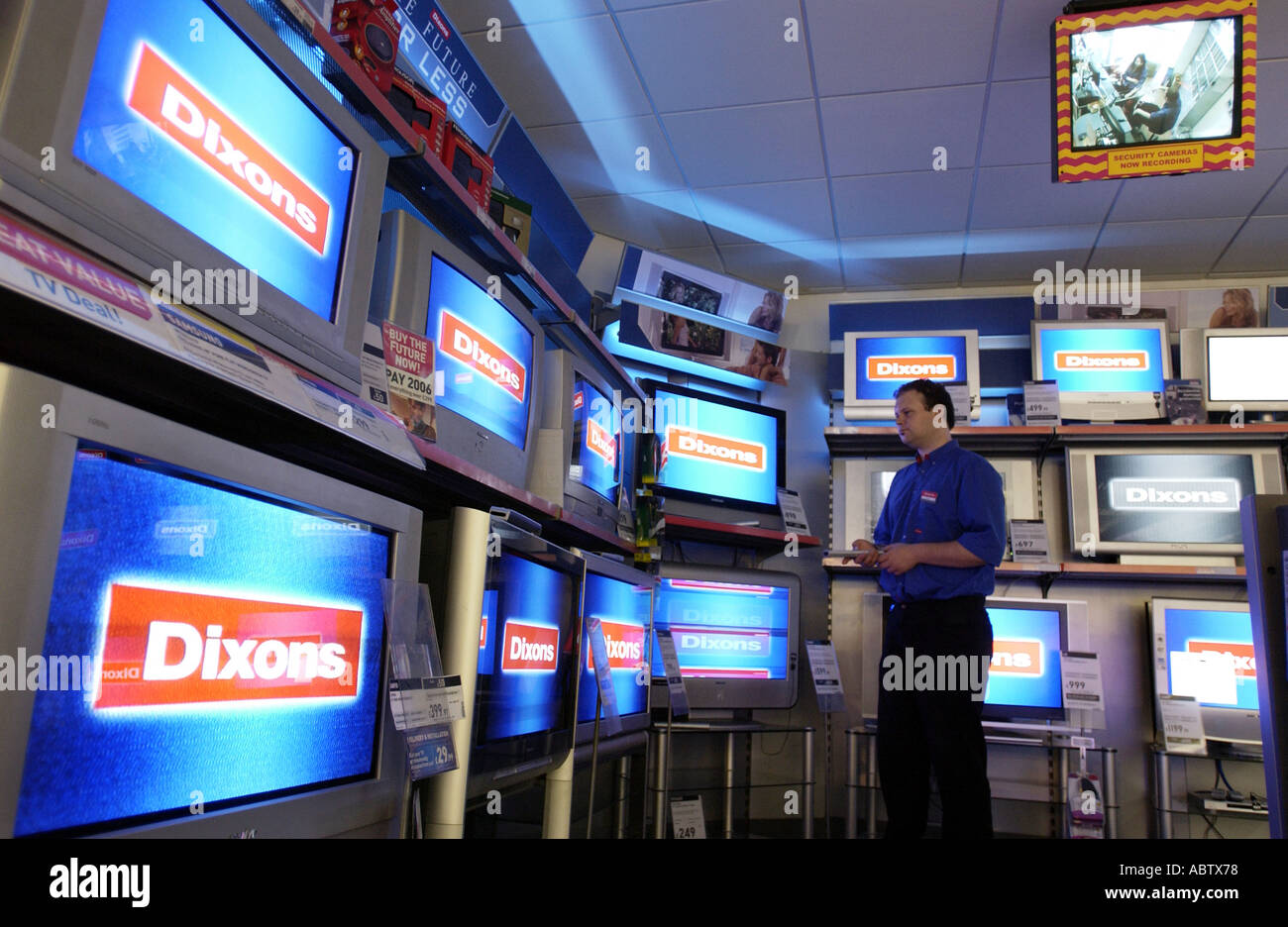Banks of televisions in Dixons store in Brighton Stock Photo