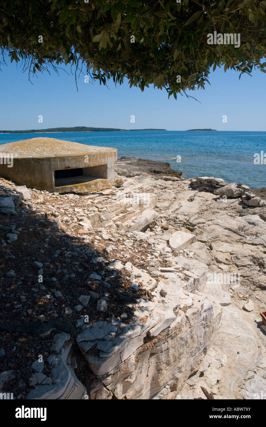 WW2 remains of coastal bunker on Vrbanj Bay on Brioni islands, Veliki Brijun, Croatia Stock Photo