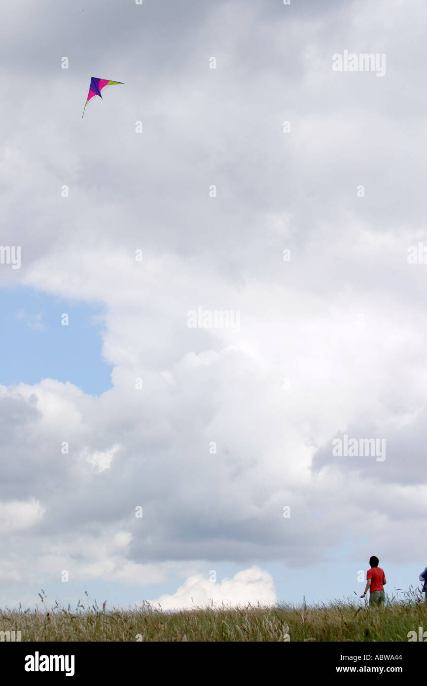 A man flys a kite on Parliament Hill, Hampstead Heath, London, UK Stock