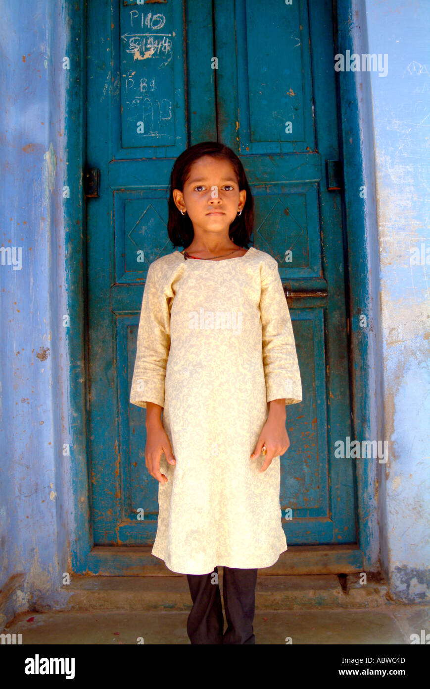 Indian Girl in Doorway Stock Photo