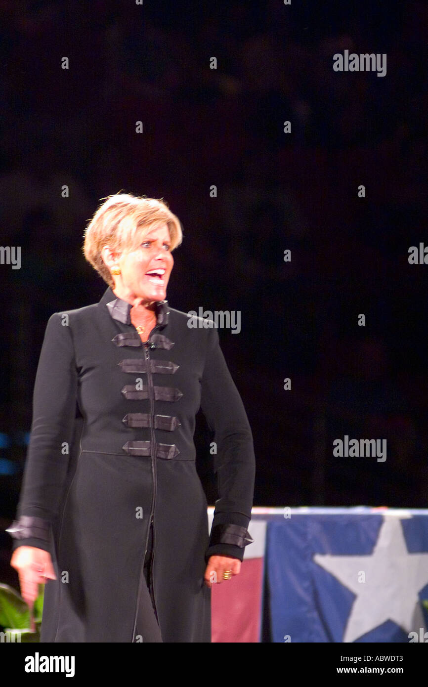 Business analyst Suze Orman speaking lecture to large crowd during