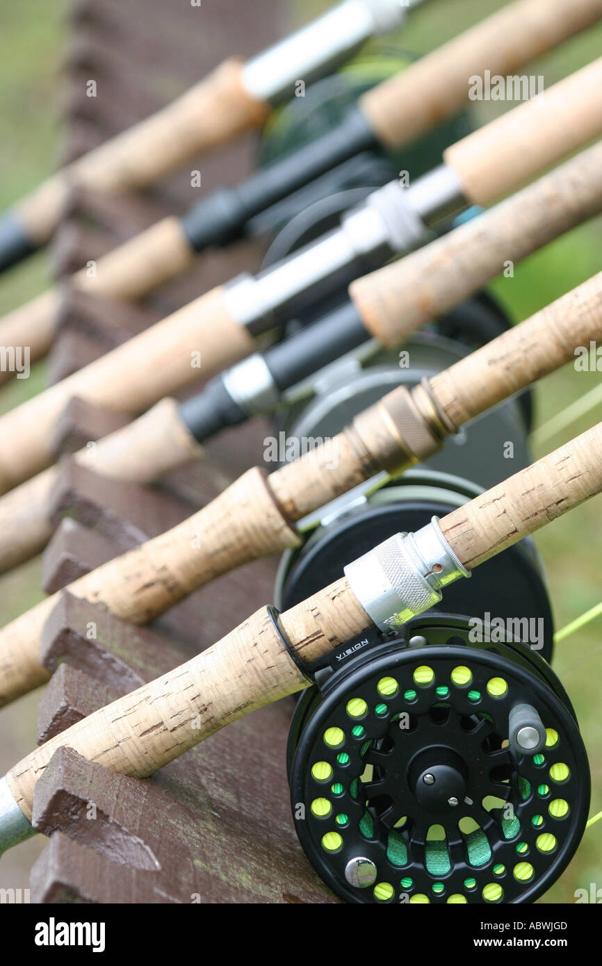 Salmon rods and reels in a rod stand Stock Photo - Alamy