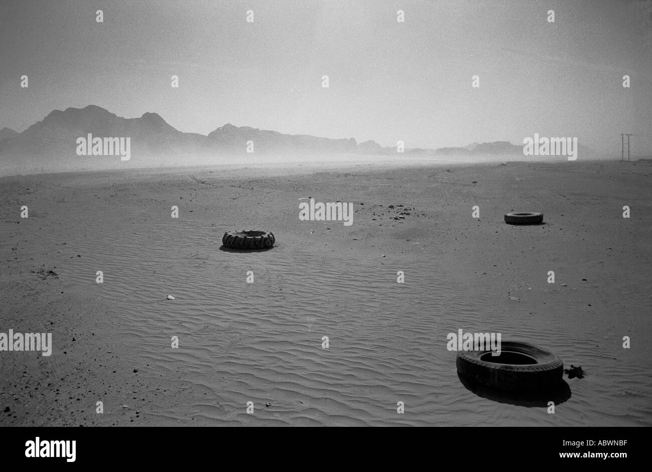 3 tires in the desert jordan Stock Photo