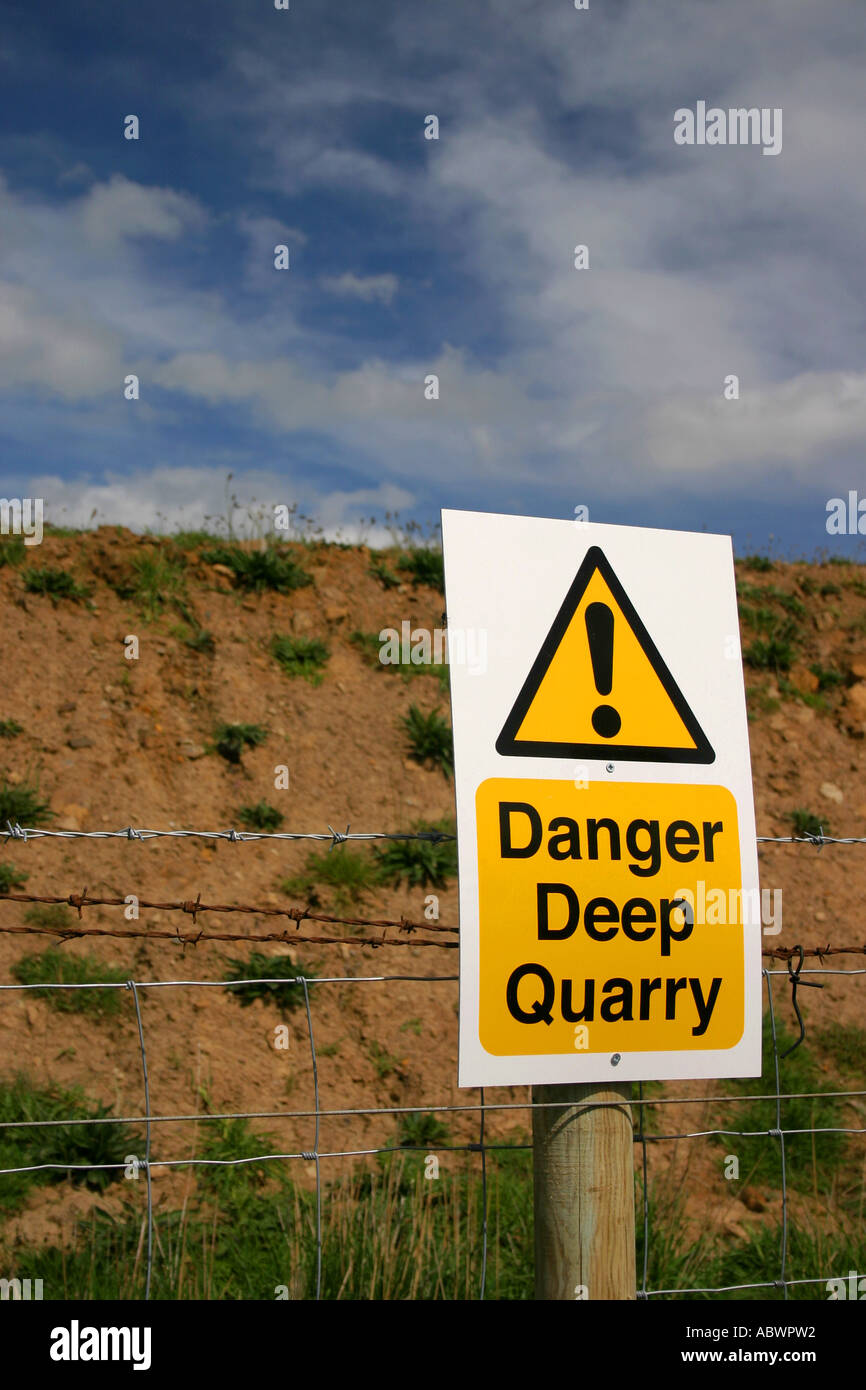 Danger Deep Quarry warning sign near Longhoughton Northumberland United Kingdom Stock Photo