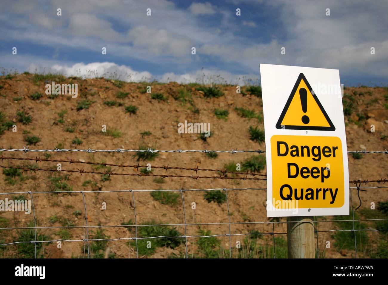 Danger Deep Quarry warning sign near Longhoughton Northumberland United Kingdom Stock Photo