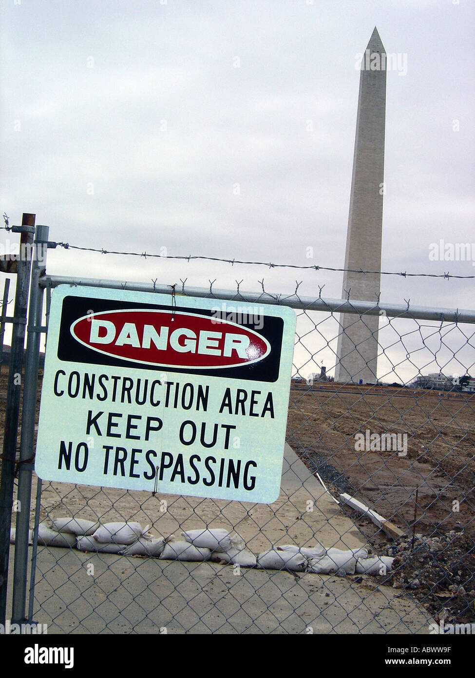 Washington Monument Chain Link Fence and Danger Construction Area Keep Out No Trespassing Sign Washington DC USA Stock Photo