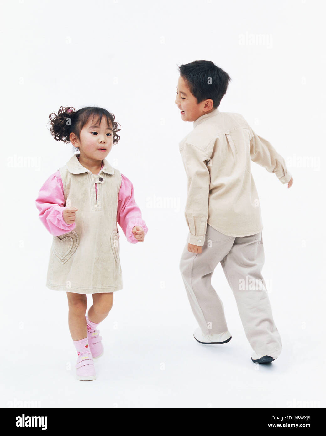 Two children playing together Stock Photo - Alamy