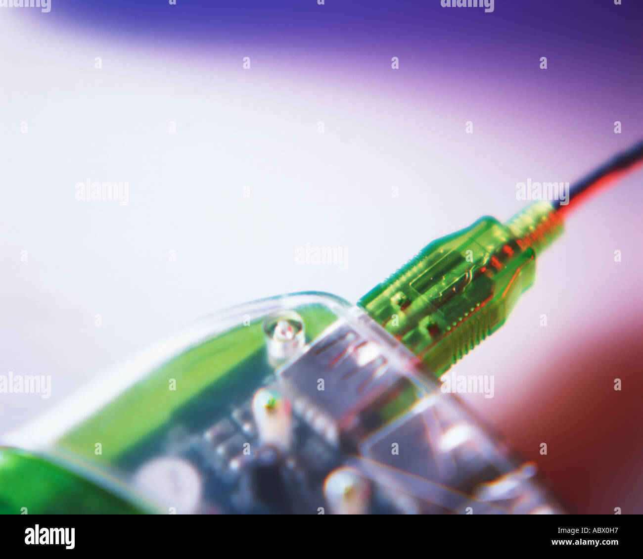 Close up of a plug inserted in the socket of an electrical device Stock ...