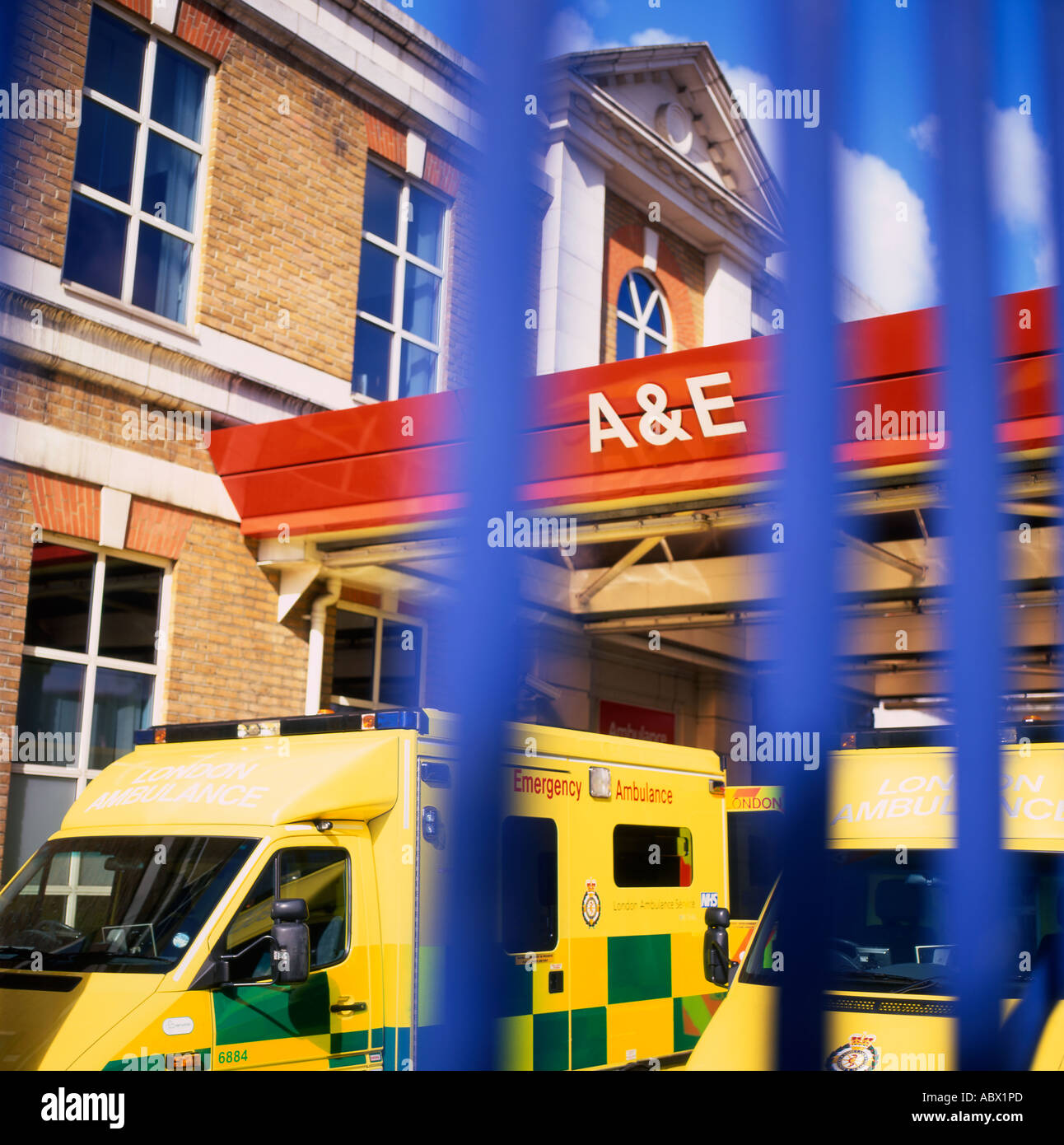 A&E sign, entrance and ambulances at Kings College Hospital in