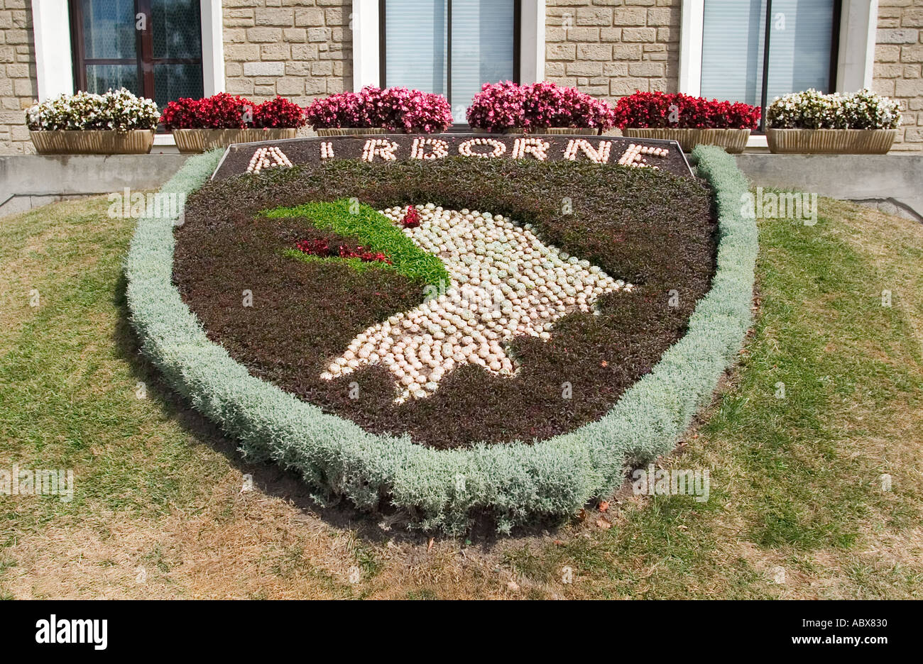 Memorial flower bed in the form of the insignia of the US WW2 101st Airborne Division Carentan Normandy France Stock Photo