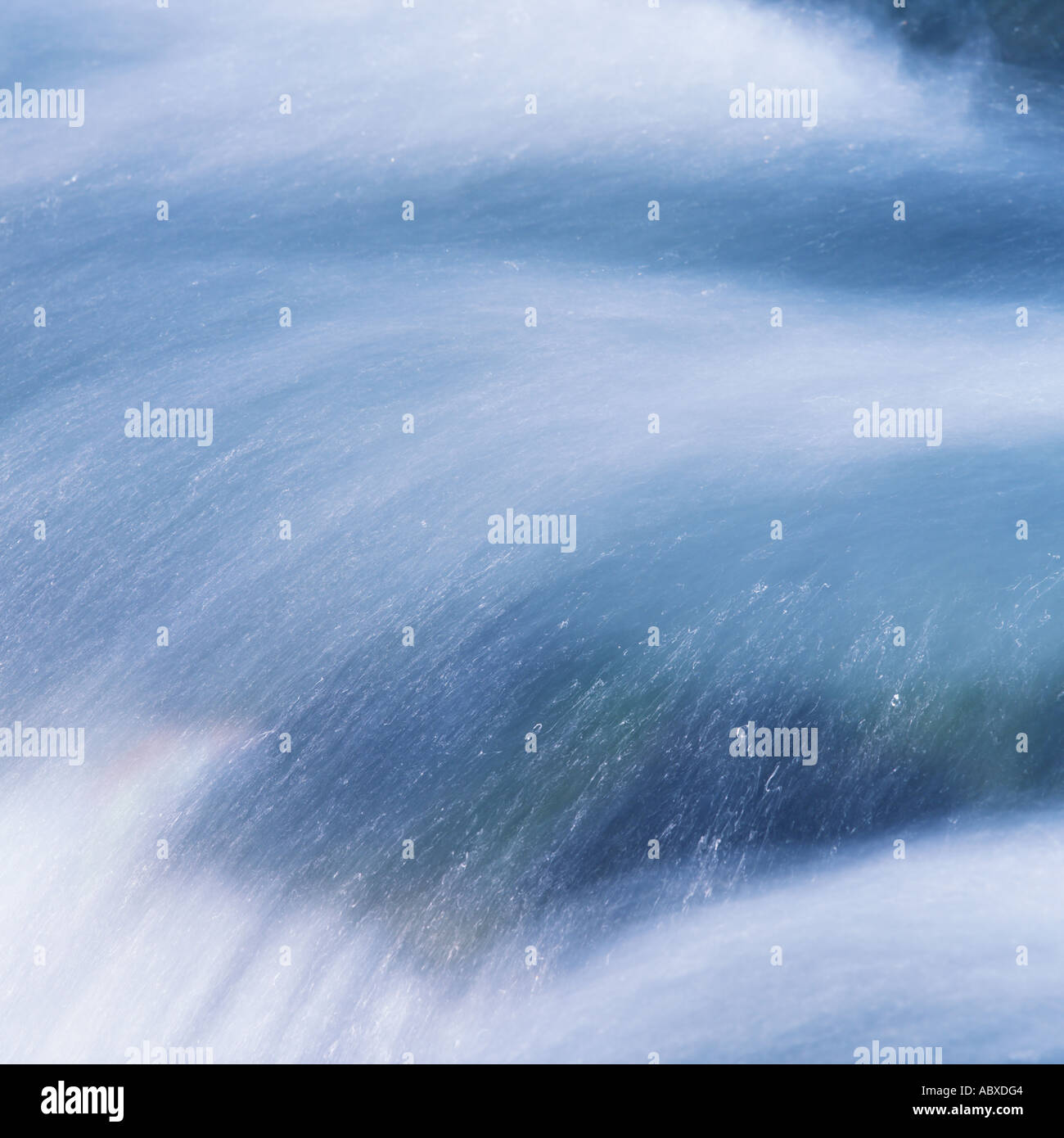Water flowing rapidly in stream Stock Photo - Alamy