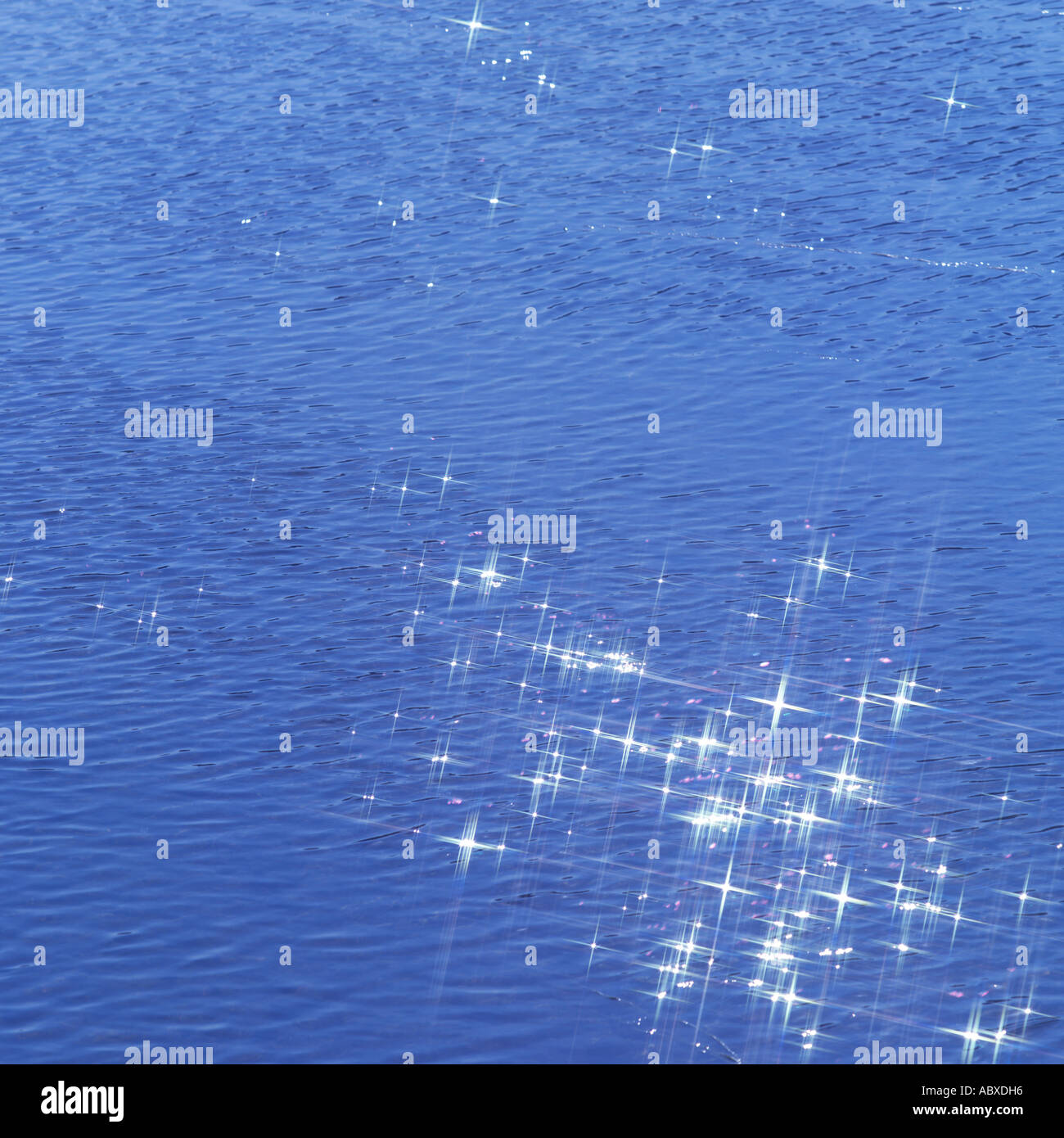 Sunlight reflected on water surface Stock Photo - Alamy