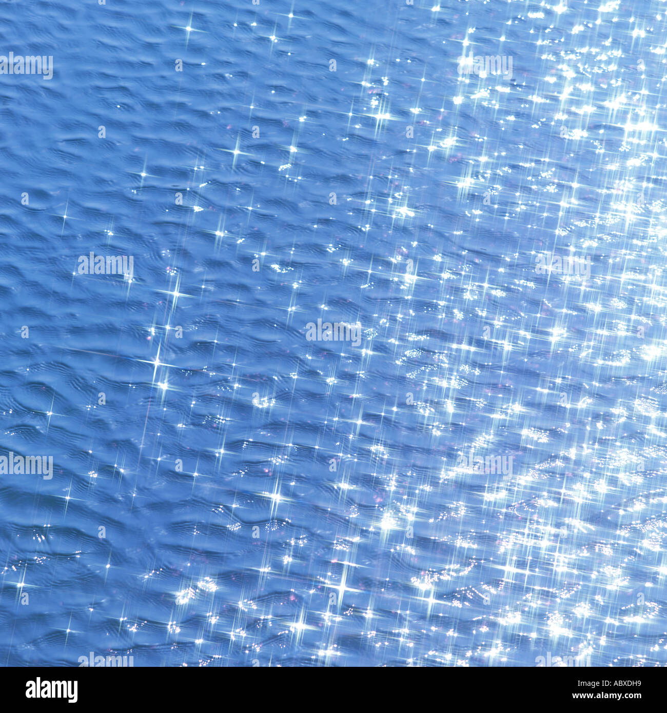 Sunlight reflected on water surface Stock Photo - Alamy