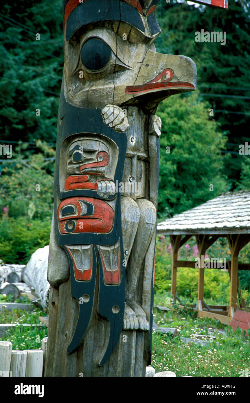 Totem pole in the Tlingit Indian village Alaska AK Stock Photo