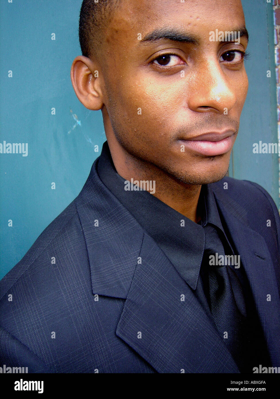 Casual Portrait of an African American Man in a Dark Suit He is ...