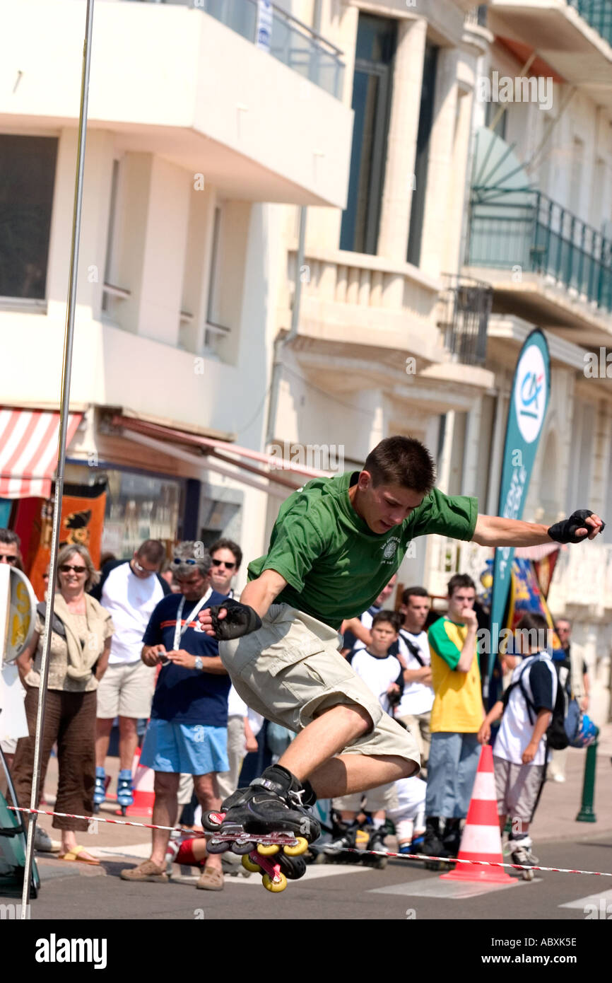 Roller skater jumping high bar Stock Photo Alamy