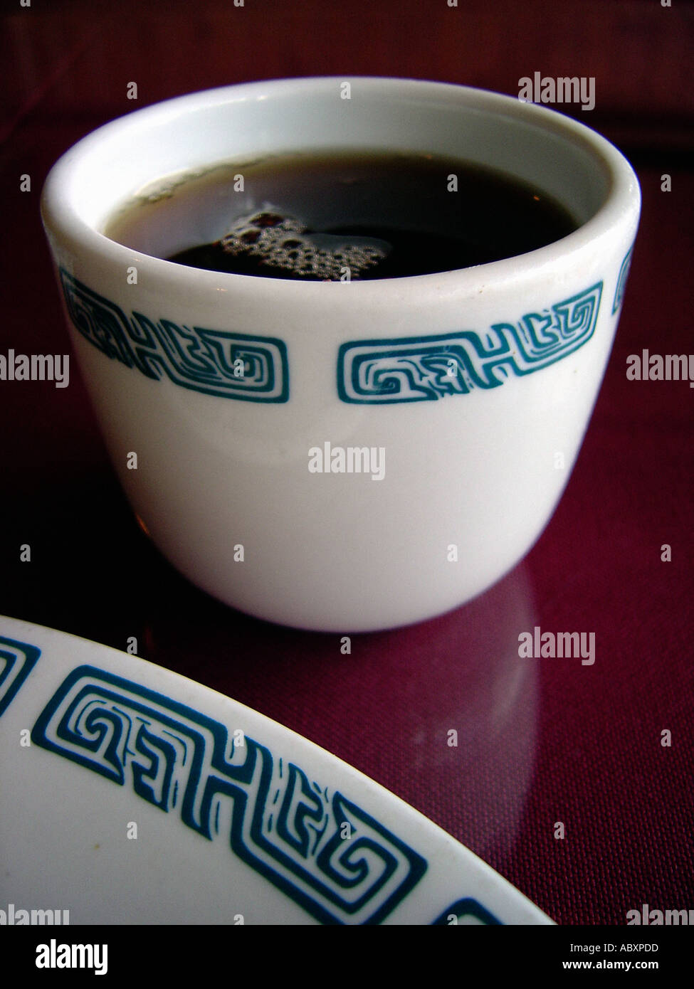 Still Life of a Cup of Tea Served in a Traditional Chinese Tea Cup at a