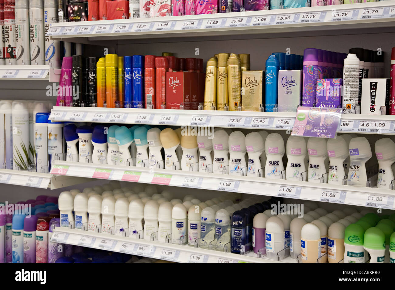 Range of deodorants and hygiene sprays on shelves for sale in shop Wales UK Stock Photo