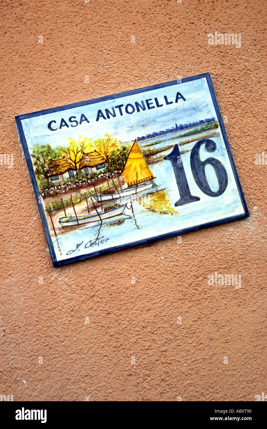 A decorative address plaque in the town of Grado in the Friuli-Venezia Giulia region of Italy. Stock Photo