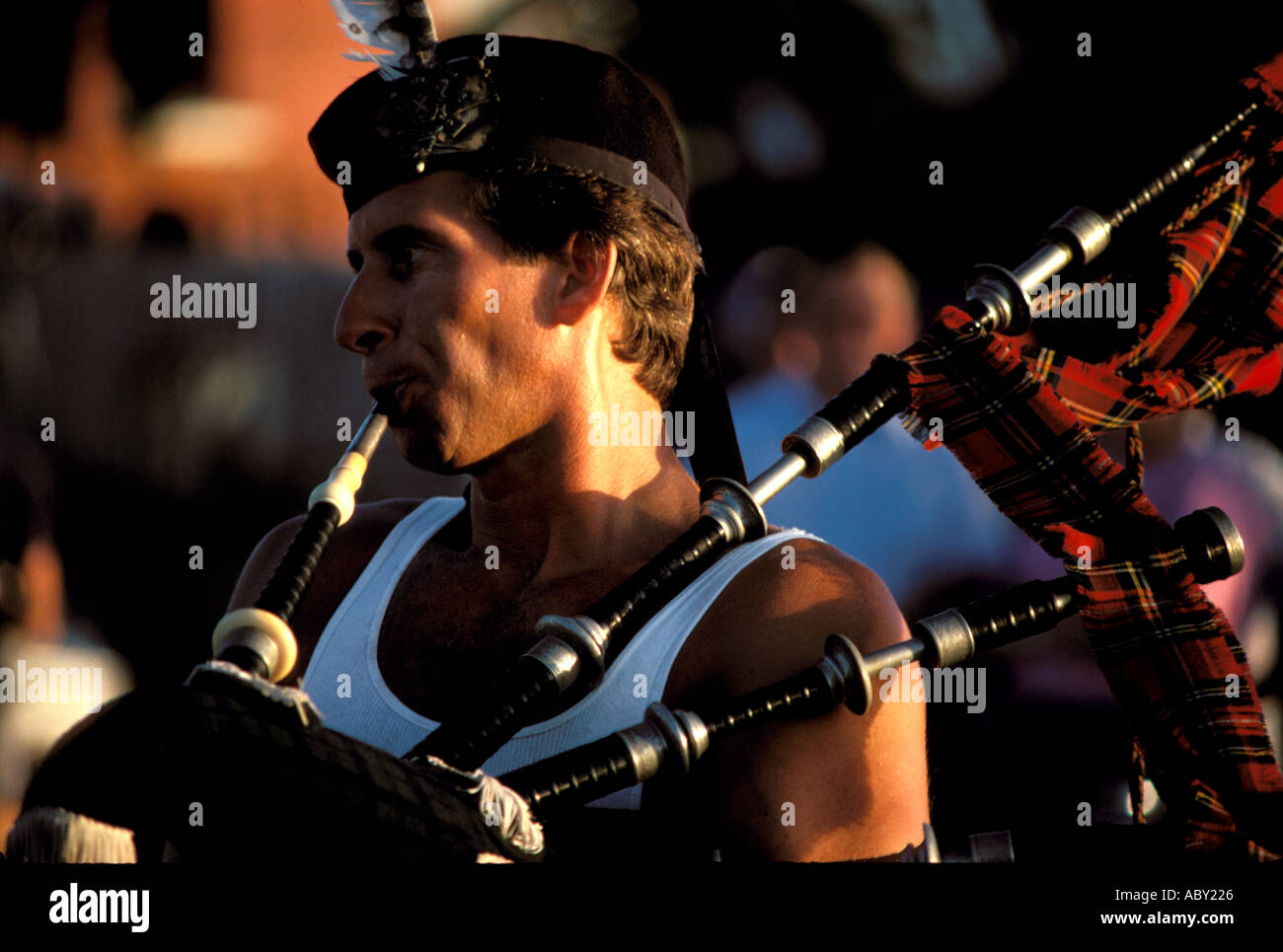 Bagpipes player sunset mallory square pier Key West Florida Keys USA