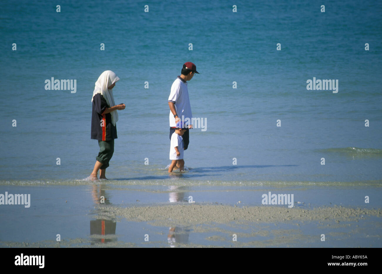 Family Walking On The Beach Langkawi Malaysia Stock Photo