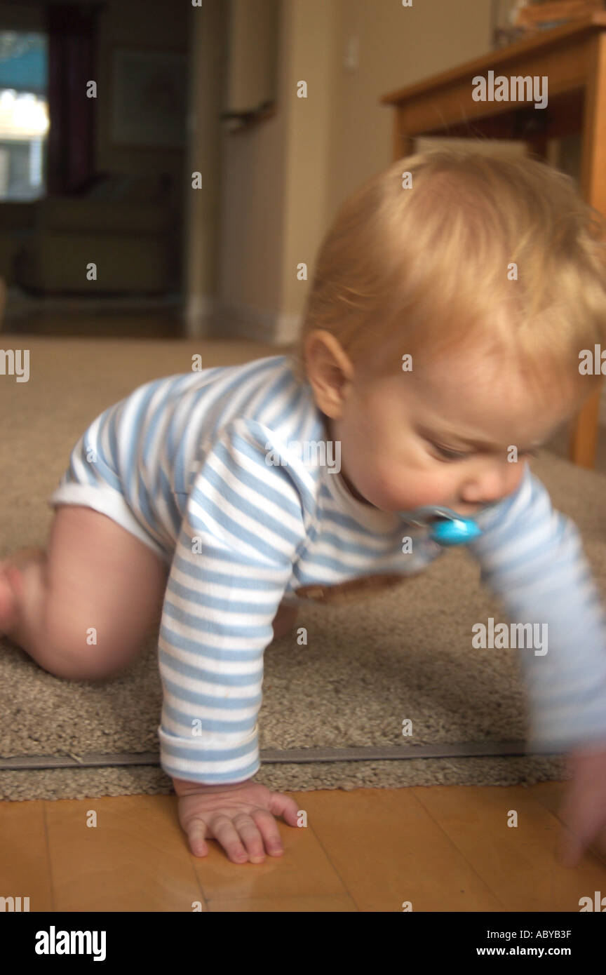 Baby moving arms hires stock photography and images Alamy