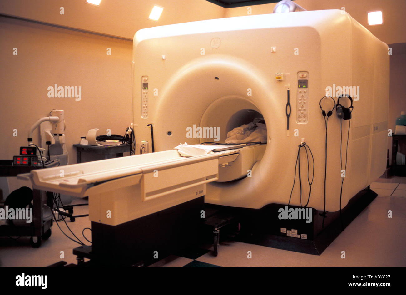 Magnetic Resonance Imaging MRI machine being used to scan and diagnose a  four year old girl Stock Photo - Alamy
